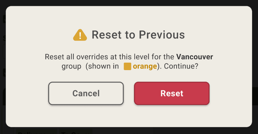 Reset to Previous dialog: 'Reset all overrides at this level for the Vancouver group (shown in orange). Continue?' with Cancel and Reset buttons